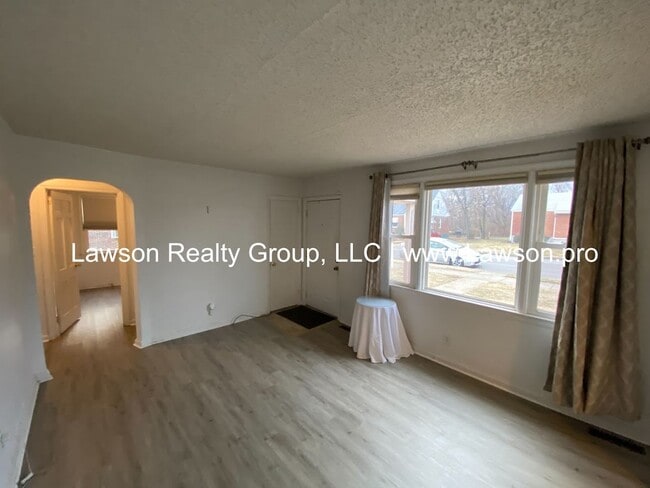 Building Photo - Well Maintained Three Bedroom with Fenced Yard and Shed