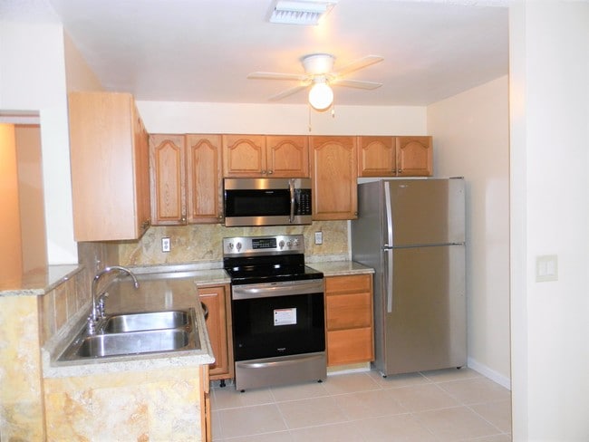 Building Photo - 9960  Pineapple Tree Drive 209