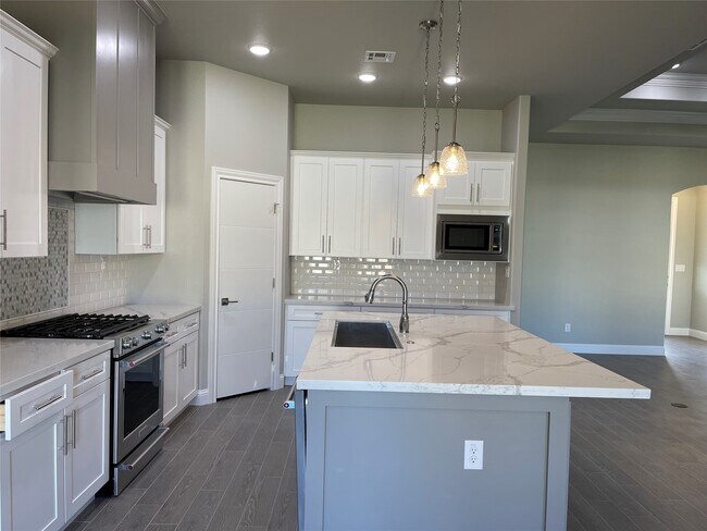 Foto del edificio - 10440 Dominion Ranch Dr