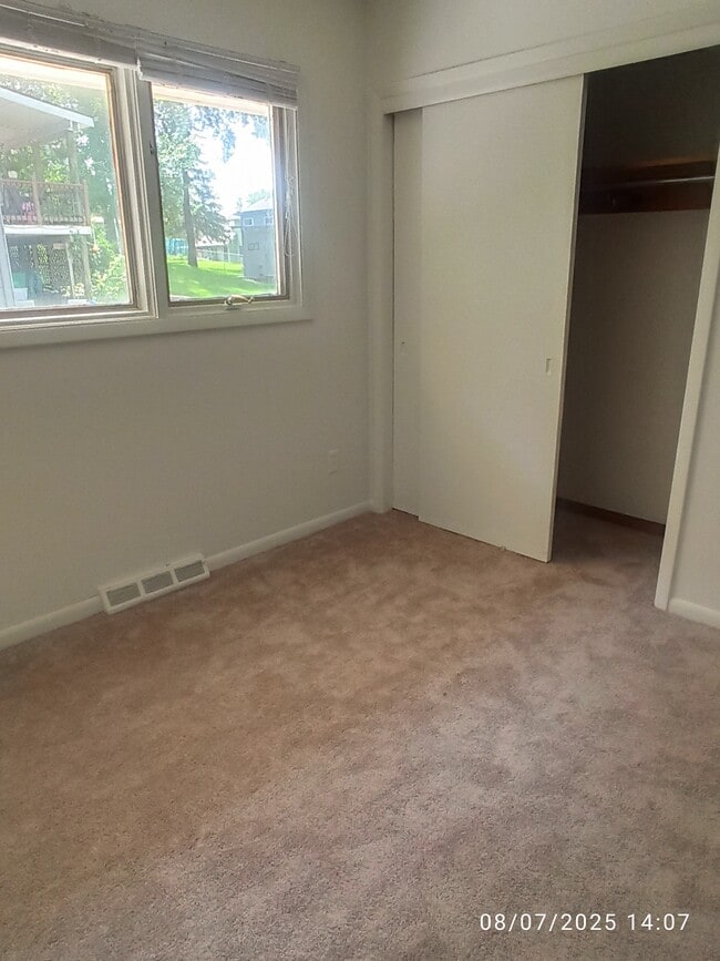One of the two bedrooms. New carpet new paint - 2826 67th St