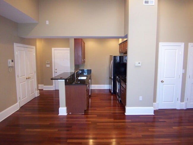 Building Photo - Be Majestic at the Majestic Condominiums! ...