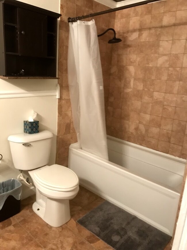 Shared downstairs bathroom with tile - 526 Monroe St