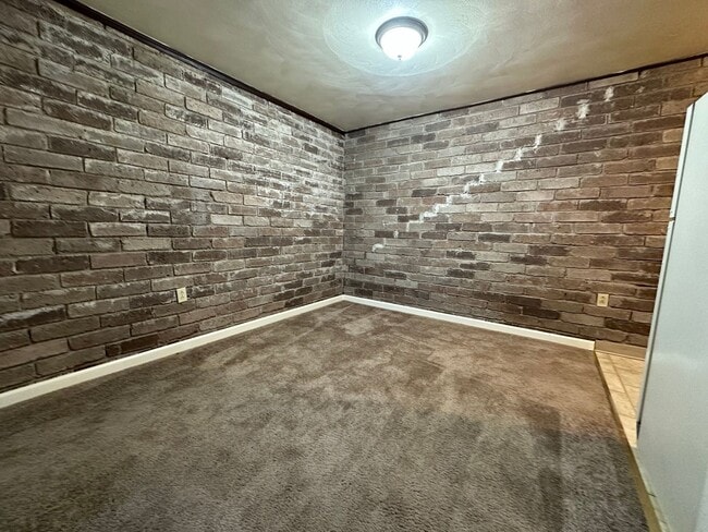 Photo - One Bedroom Apartment with Exposed Brick & Off-Street Parking! Tour this Stunning One Bedroom Today!