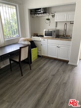 Building Photo - 451 S La Peer Dr