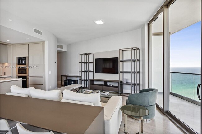 Building Photo - 18975 Collins Ave