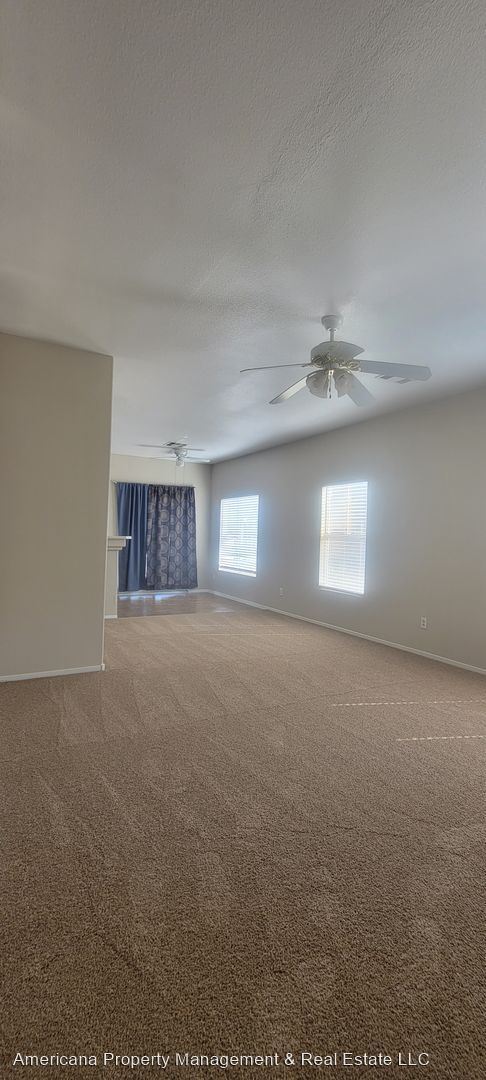 Building Photo - 2 br, 2.5 bath House - 6470 Saddle Up Ave ...