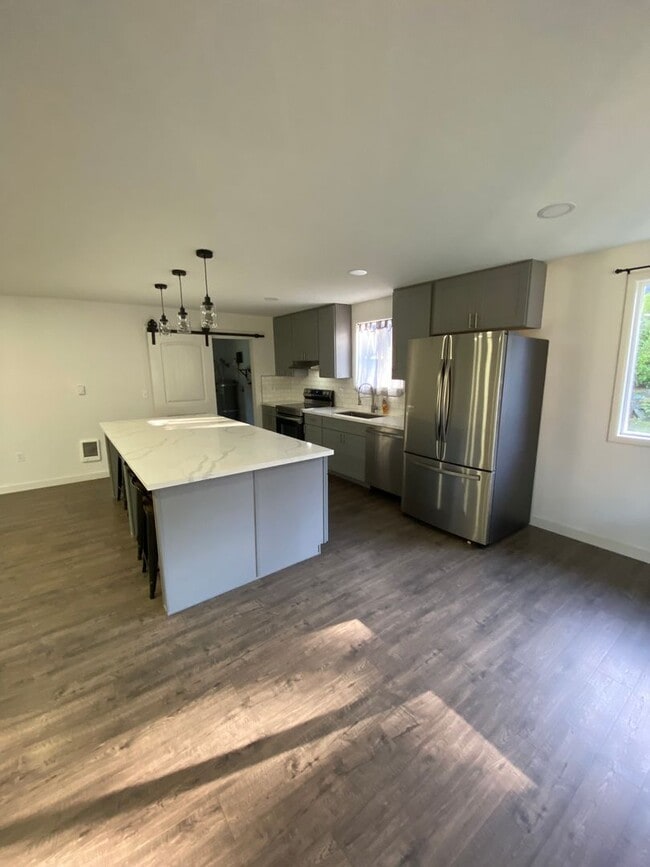 Building Photo - BRING YOUR ATVS - JUST MINUTES FROM THE OREGON DUNES!