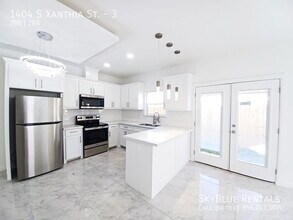 Building Photo - 1404 S Xanthia St