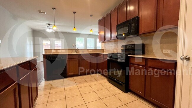 Foto del edificio - 5805 Rubblestone Dr