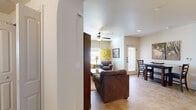 Located at 2602 W Richey Ave in Artesia, New Mexico, this single-story 2-bedroom, 2-bathroom home offers a comfortable and efficiently designed layout. The living room welcomes you with tile flooring, a ceiling fan, and a large window that brings in natural light, creating a warm and inviting atmosphere. Elegant arched architectural details add character to the entryway connecting the living and dining areas.

The kitchen is equipped with warm wood cabinetry, light countertops, a double sink, and black appliances including a dishwasher and range, with a window above the sink providing additional natural light.

Both bathrooms feature tile flooring, wood vanity cabinets with light countertops, and tub-shower combinations with tile surrounds. The primary bedroom is generously sized, featuring a ceiling fan, light wood-style tile flooring, a sliding glass door with outdoor access, and direct entry to both a private bathroom and a dedicated closet. The second bedroom also includes a ceiling fan and ample natural light.

A dedicated laundry room with full-size washer and dryer hookups adds everyday convenience. Two closets provide practical storage throughout the home, making this a well-rounded and functional residence.