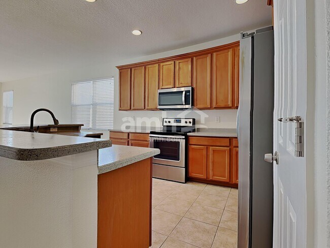 Foto del edificio - 6019 Blue Sage Dr