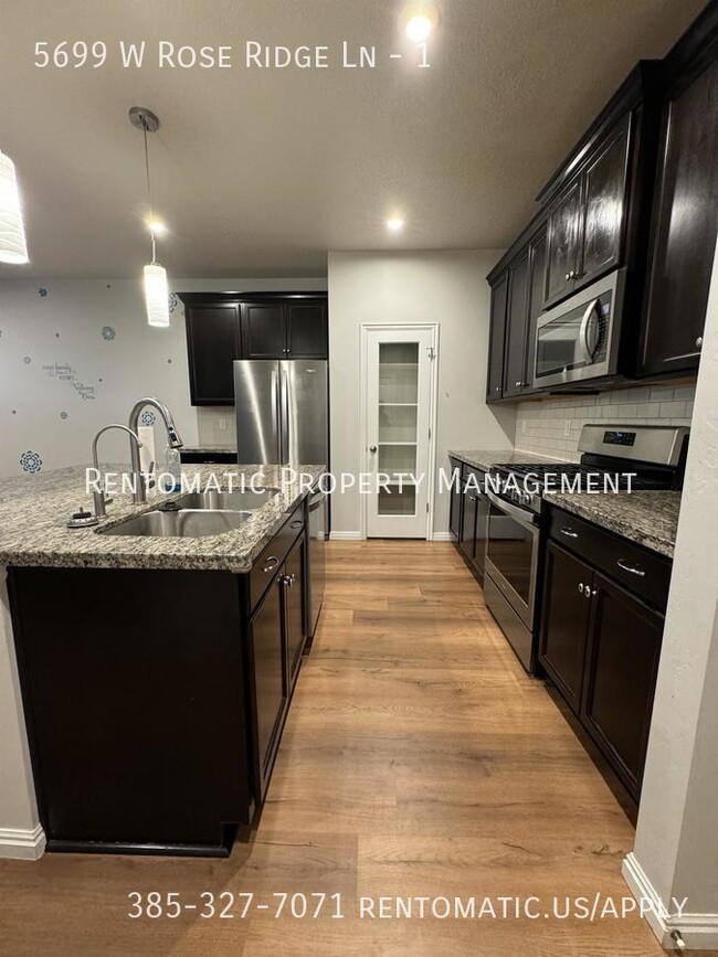 Building Photo - 5699 W Rose Ridge Ln