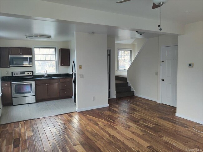 Kitchen/Living/Stairwell to upper fl. - 235 Main St