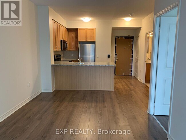 Photo du bâtiment - 349-349 Rathburn Rd W