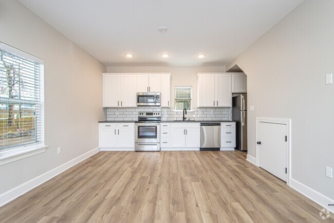 Building Photo - 1 Bed 1 Bath Luxury Energy Efficient Townh...