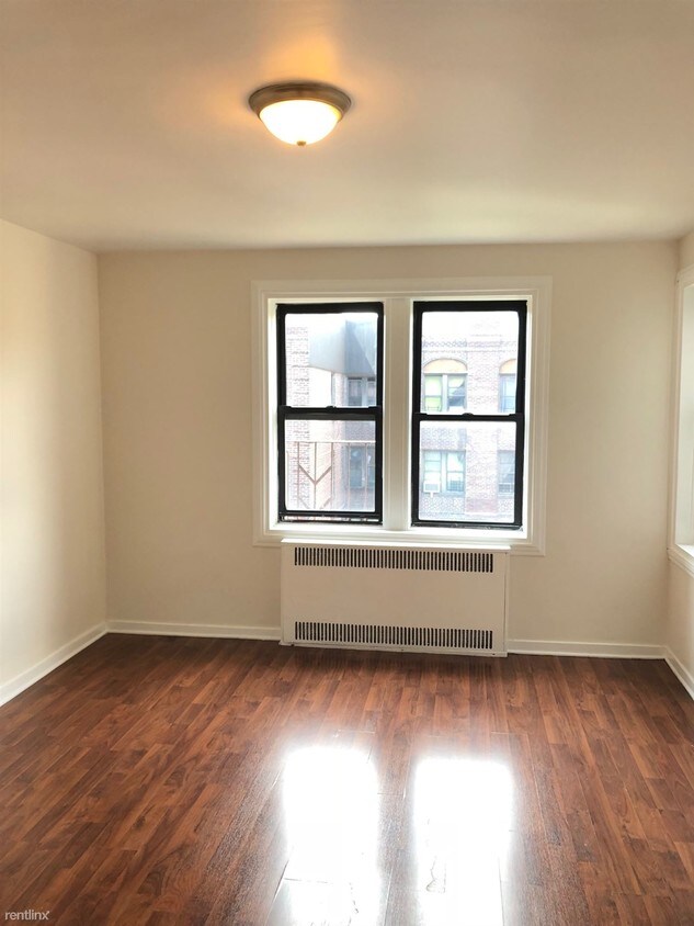 Foto del edificio - 1 br, 1 bath  - 8835 Elmhurst Ave 6F