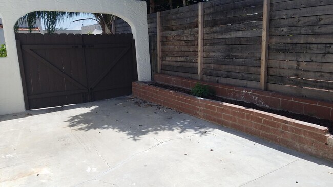Parking area/patio - 3264 Landis St