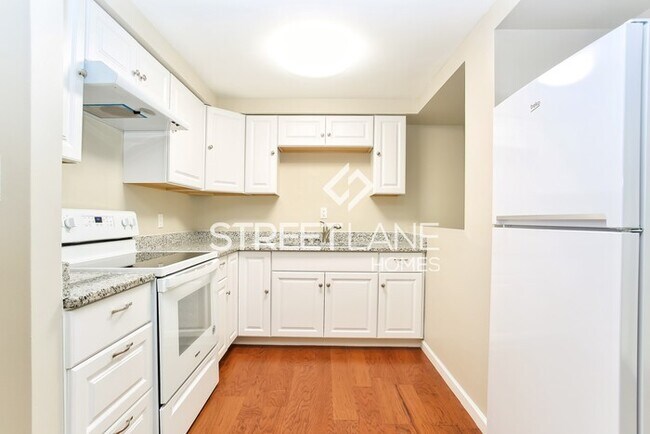 Building Photo - REDUCED! - $1500 off first full month!!