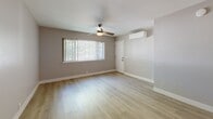 Located at 1605 Santa Clara Dr in Roseville, CA, this efficiently designed one-bedroom, one-bathroom unit offers a thoughtfully arranged single-floor layout with cohesive, modern finishes throughout. Light-toned hardwood-style flooring runs continuously across all rooms, lending a clean, unified aesthetic to the entire space.

The kitchen is well-appointed with warm honey-toned shaker cabinetry, granite countertops, recessed lighting, and a full suite of stainless steel appliances, including a gas range, dishwasher, and refrigerator. The kitchen opens toward the living area, creating an efficient and connected layout.

The living area benefits from natural light through a window fitted with vertical blinds and includes a ceiling fan for added comfort. A wall-mounted mini-split system provides climate control throughout the unit.

The bedroom is a comfortable, well-proportioned retreat featuring soft gray walls, a mirrored sliding closet, a mini-split unit, and a sliding glass door that opens to a private balcony overlooking greenery outside.

The bathroom is bright and clean, finished in white with light wood flooring, a tub-shower combination with marble-style tile surround, and a gray vanity with brushed nickel hardware.