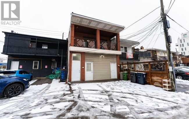 Building Photo - 713 The Queensway