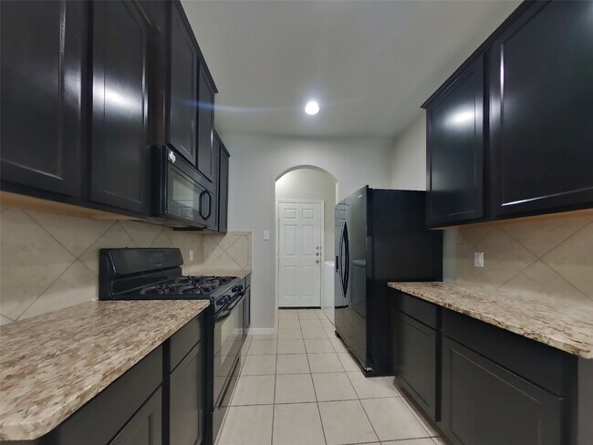 Foto del edificio - 6706 Honey Harvest Ln