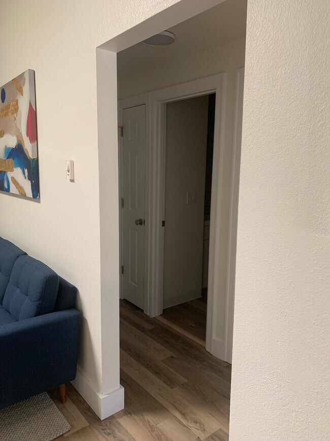 Hallway entry to BRs/BA - 2680 SW 87th Ave