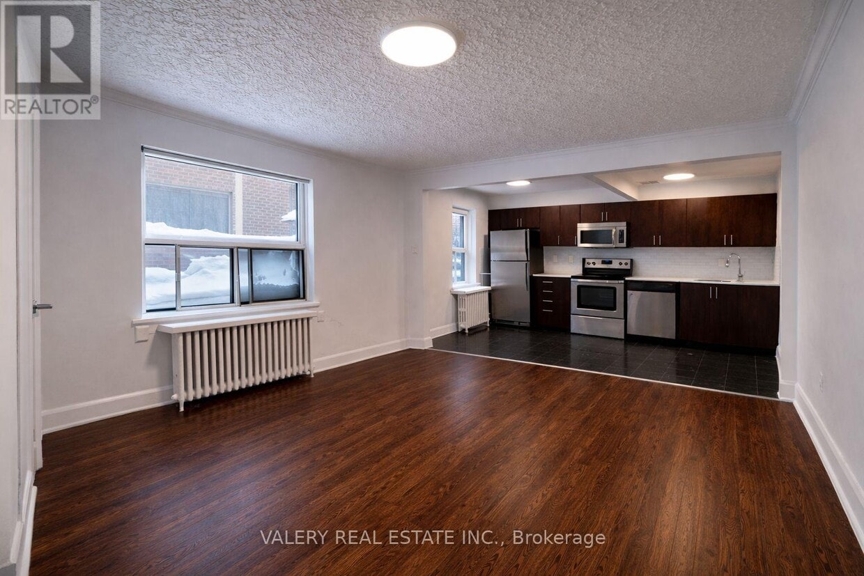 Building Photo - 2404 Queen St E