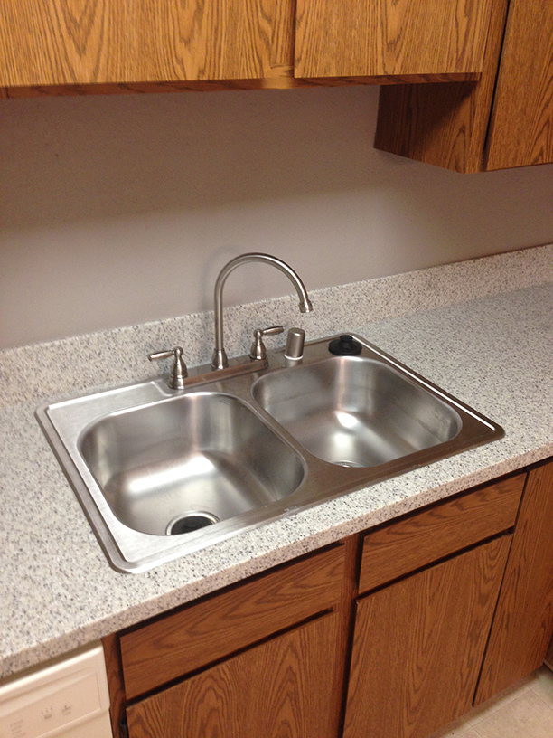 Kitchen with updated solid surface countertops - Edmonds Crest