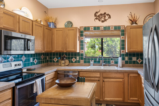 View of kitchen appliances and window - 2746 W Calle San Isidro