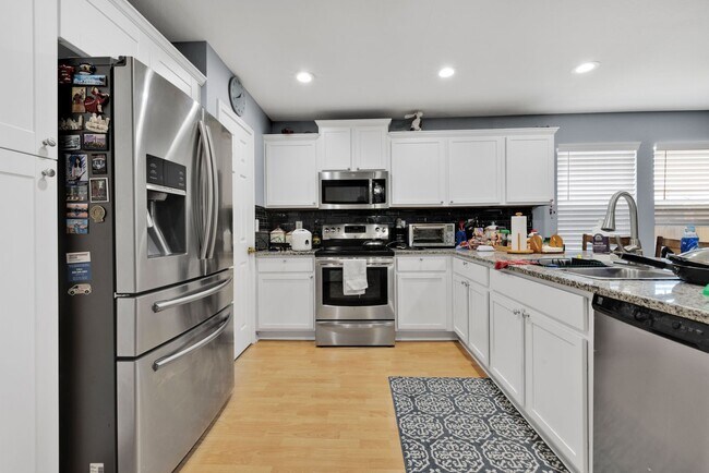 Building Photo - Spacious 4-Bedroom Home with Modern Update...