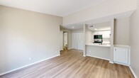 This 510 square foot apartment in Dallas, TX offers a compact yet well-designed living space. The single-floor layout comprises one bedroom, one bathroom, and an open-concept kitchen and living area. The primary bedroom, measuring 140 square feet, provides ample space and features a ceiling fan and large window for natural light.

The apartment boasts modern updates throughout, including light wood-look flooring and neutral-toned walls. The kitchen showcases white cabinetry, stainless steel appliances, and a sleek backsplash, optimizing functionality in a compact space. The bathroom features a clean, white design with a shower/tub combination.

Natural light floods the living area through large sliding glass doors, which also provide access to a balcony, extending the living space outdoors. The open floor plan creates a sense of spaciousness, with the living room seamlessly flowing into the dining and kitchen areas.

Storage solutions include a dedicated closet space and built-in cabinets. The apartment's neutral color palette and modern fixtures create a contemporary ambiance, suitable for various decorating styles. Located at 15678 Knoll Trail Drive, this efficient apartment offers a comfortable living solution in a desirable Dallas neighborhood.