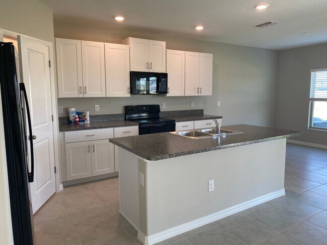 Building Photo - 4bed 2.5bath SFH in Touchstone-7031 Samuel...