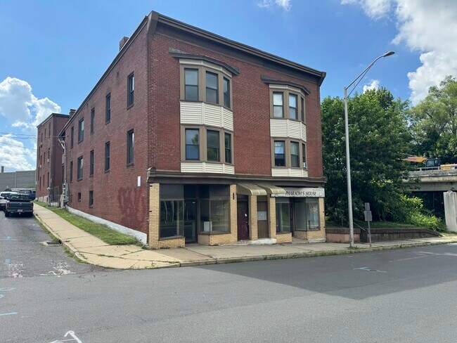 Front of apartment building - 67 E Main St