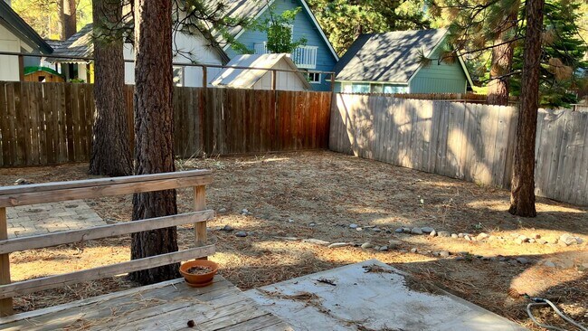 Building Photo - Large home with garage and fenced backyard