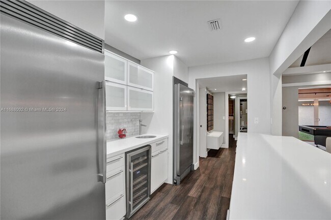 Foto del edificio - 6106 Royal Poinciana Ln