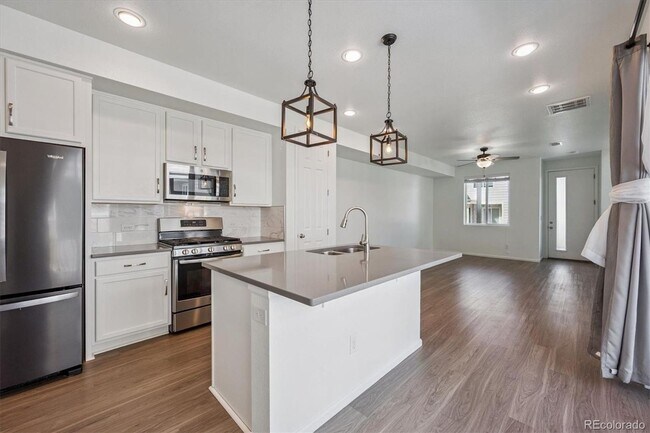 Photo - GEORGEOUS 3 bedroom townhome, with 2 car garage!
