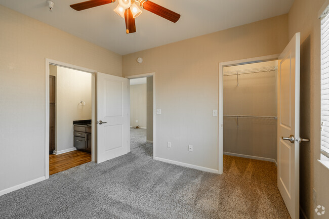 1BR, 1BA - 751SF - Bedroom - SunSTONE at MarketPlace Apartments