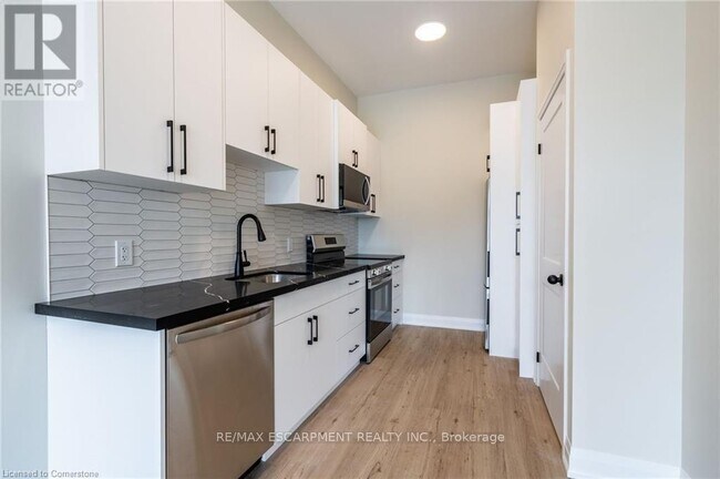 Building Photo - A - 728 ELEVENTH AVENUE