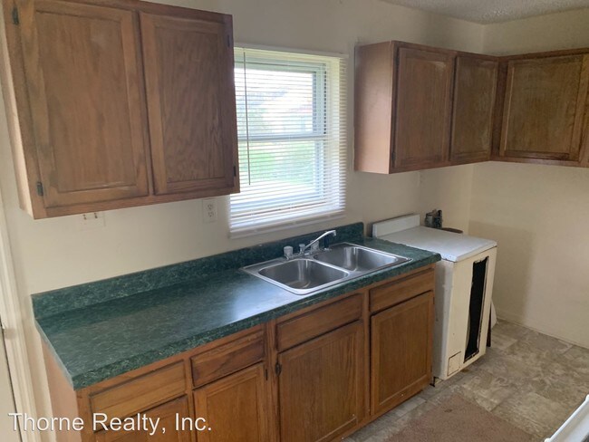 Foto del edificio - 2 br, 1 bath House - 515 E Wilson St.