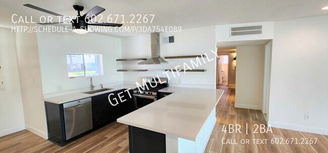 Building Photo - Stunning 4BR/2BA Home with Modern Amenitie...