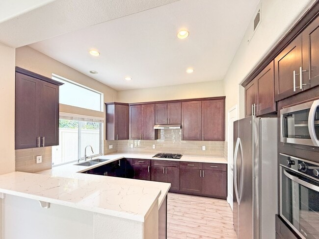 Building Photo - SD: Spacious 3BD/3BA Home in University City with Community Pool, Backyard Patio & 2-Car Garage