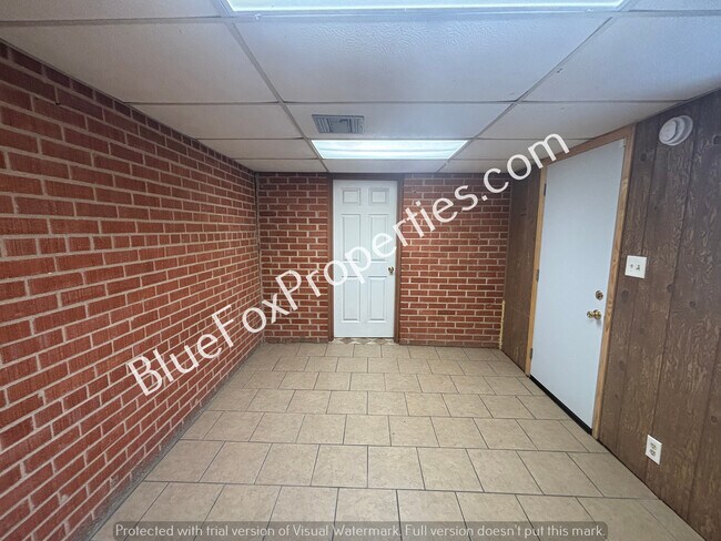 Foto del edificio - 4825 E 23rd St