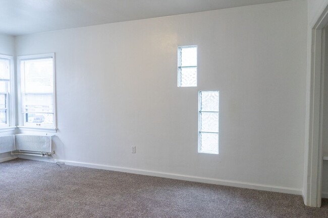 Building Photo - Tired of Roommates? Claim Your Own Space at The Interurban!