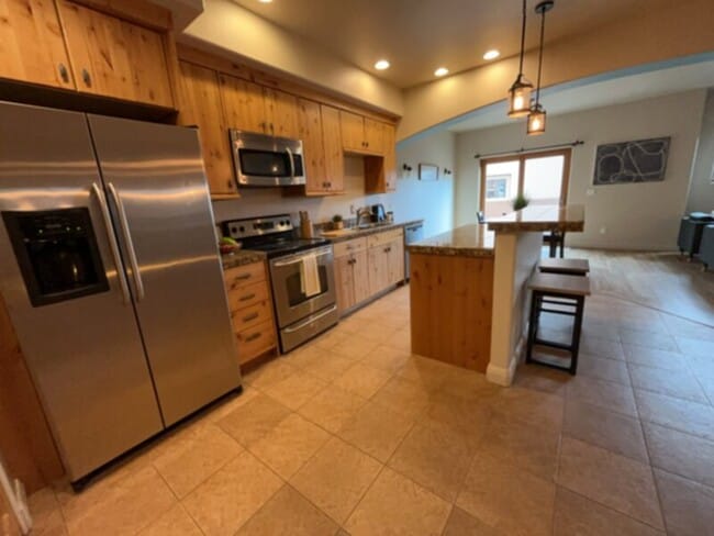 Building Photo - This unique adobe townhome in the heart of...