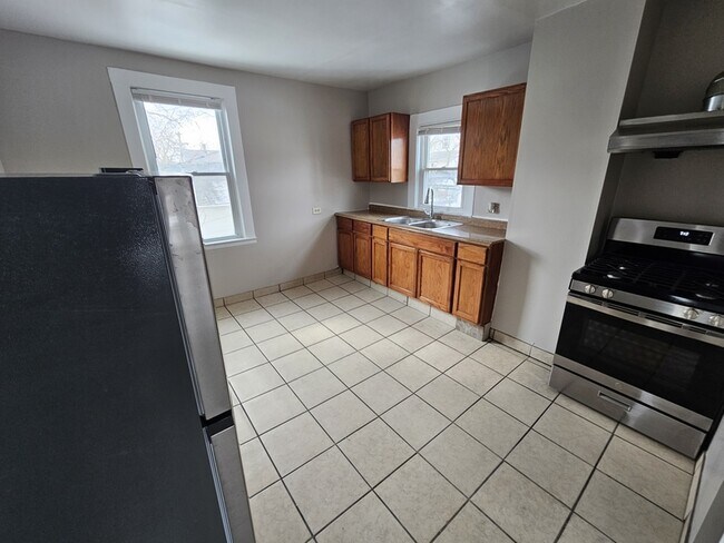 Foto del edificio - 1762 E 33rd St