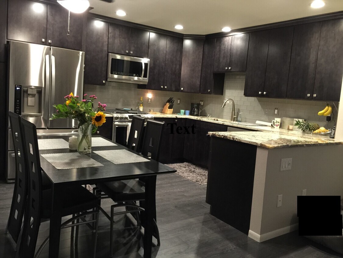 Open Concept Dining + Kitchen - 1950 S Palm Canyon Dr