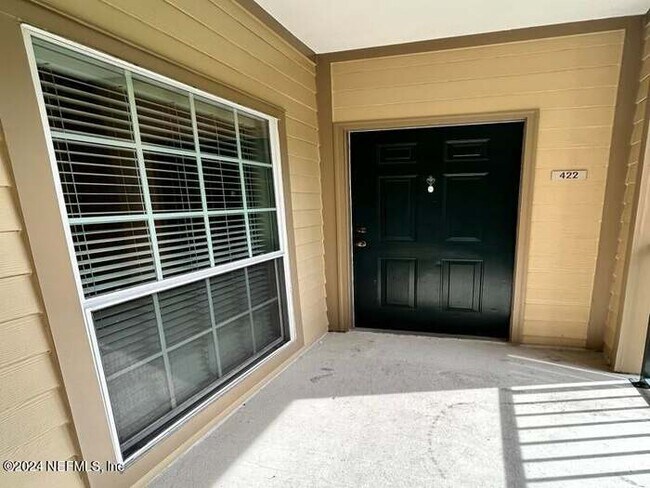 Building Photo - 7800 Point Meadows Drive #422