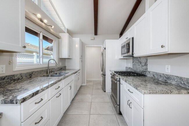Building Photo - San Diego- Near Del Cerro - Refreshed 4 bed / 2 bath Home w/Solar ,A/C, Large Yard, Garage, and M...