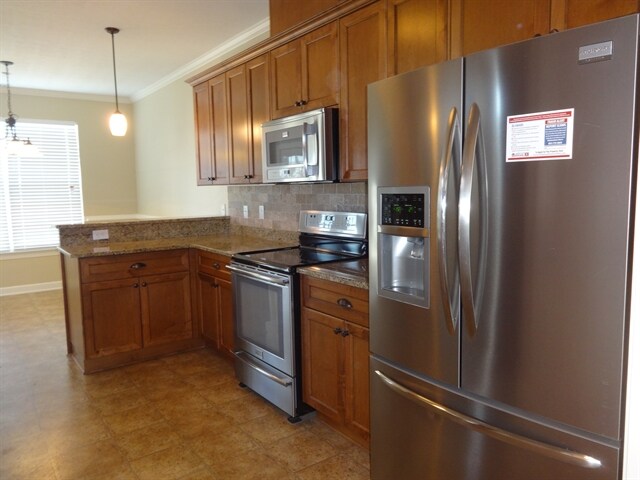 Foto del edificio - 4456 Dave Macdonald Dr