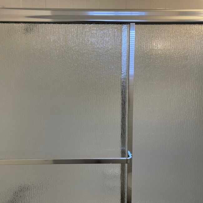 Glass Shower Doors - No more shower curtains! - 301 W Helen St